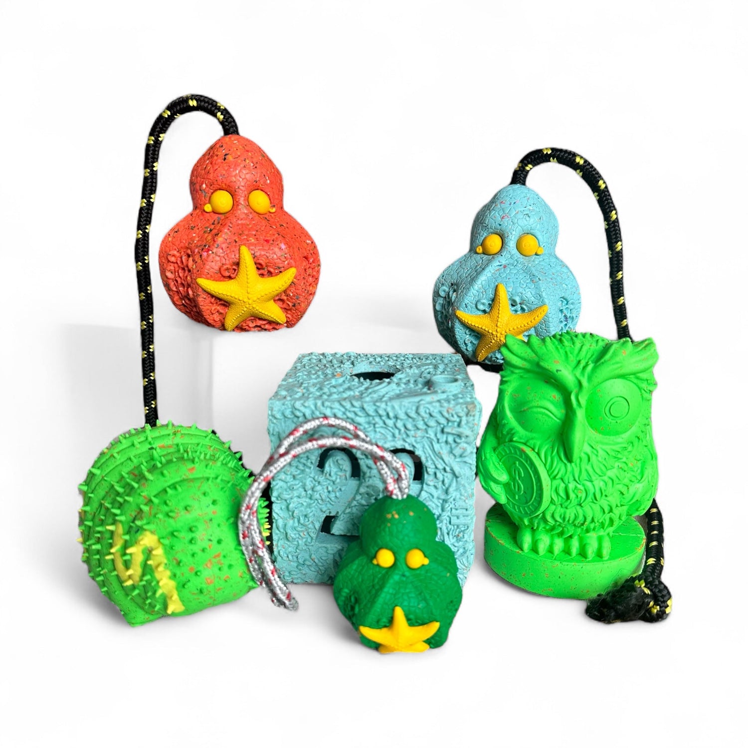 collection of dog toys made from recycled rubber