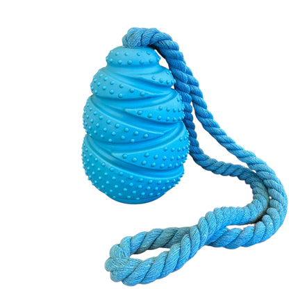 Blue textured ball with a rope on a white background