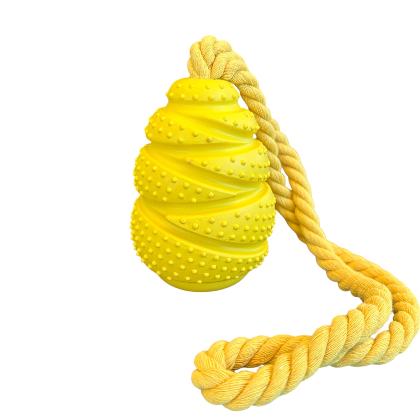 Yellow dog toy with a rope on a white background
