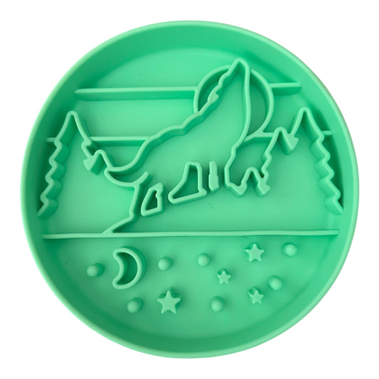 Mint silicone Dog Slow feeder bowl with mountain and wolf design. 