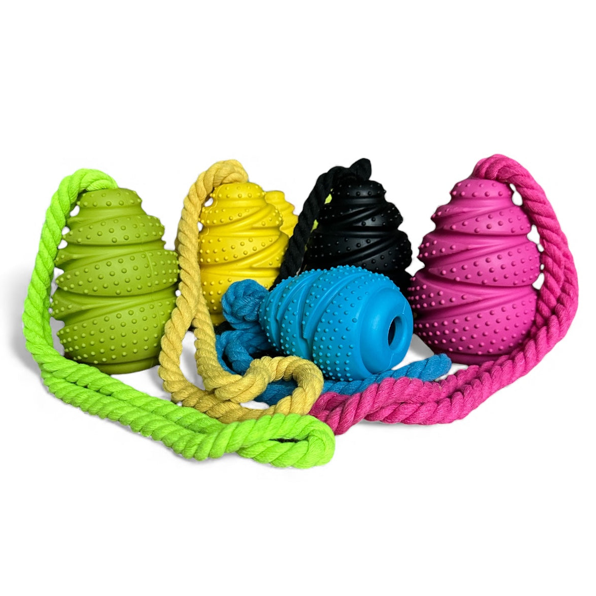 Colorful dog toys with textured balls and ropes on a white background