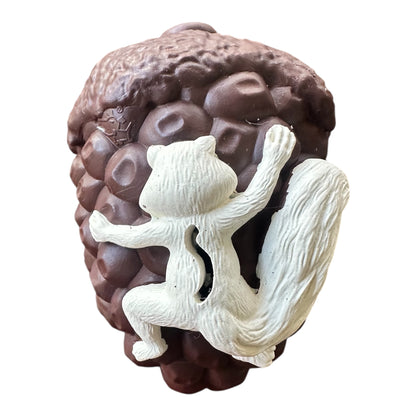 dark brown tough rubber dog toy with squirrel