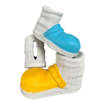 Three cute tough rubber boots made for dogs and puppies who are strong chewers.