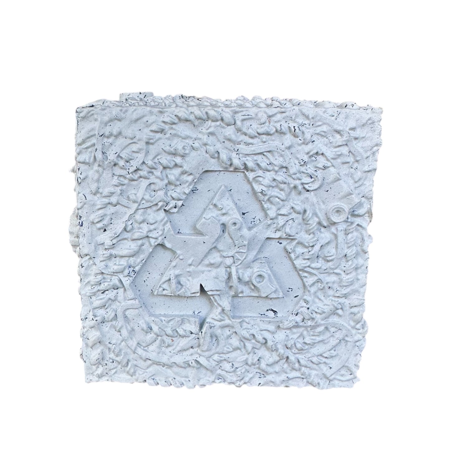 Grey rubber chew toy with recycle logo on it.